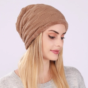 Caramel knitted trapper hat with fleece lining and checkered pattern for winter warmth