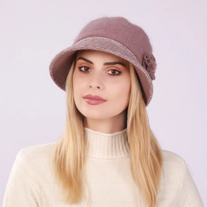 Detail view of pink knit bucket hat with velvet lining and 3D floral decoration