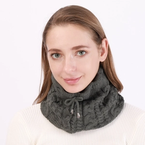 Detail of dark grey cable knit neck warmer with adjustable drawstring and metal toggle