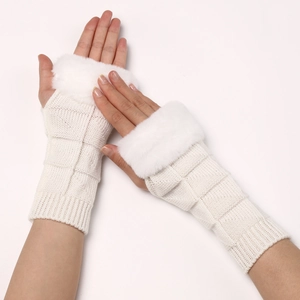 Close-up of white waffle knit fingerless gloves with fluffy faux fur trim for winter
