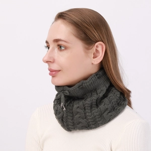 Detail of dark grey cable knit neck warmer with adjustable drawstring and metal toggles