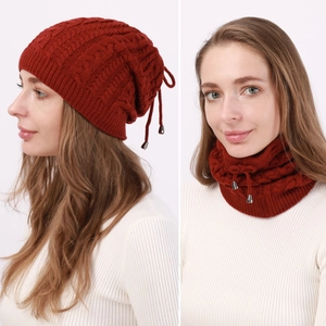 Dual-use cable knit beanie and neck warmer in burgundy with adjustable drawstring