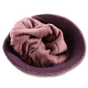 Detail view of the thick purple knit hat with soft thermal fleece lining for extra warmth