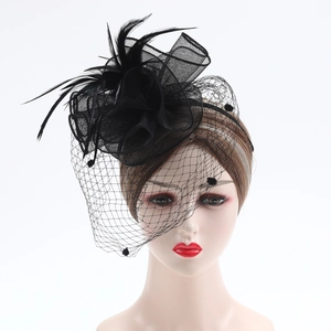 Elegant black feather fascinator hat with mesh veil and pearls for weddings and parties