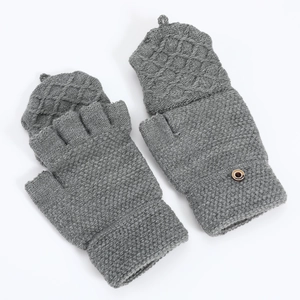 Detail of dark grey knit fingerless gloves with diamond pattern flap and button