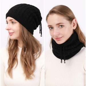 Close-up of black cable-knit 2-in-1 hat and neck warmer with adjustable drawstring details