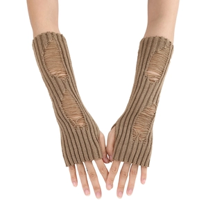 Close-up of brown distressed knit fingerless gloves with ripped texture and arm coverage