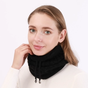 Detail of black cable-knit infinity scarf with adjustable drawstring and silver toggles