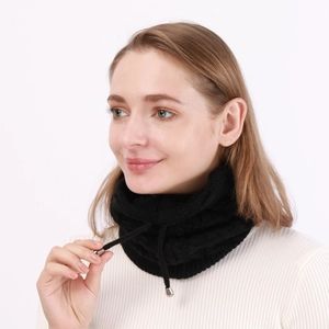 Detail of black thick knit neck warmer with adjustable drawstring and metal toggle