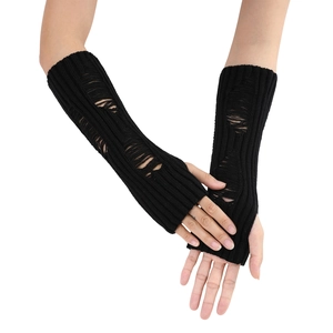 Detail of black knitted fingerless arm warmers with distressed ripped hole design
