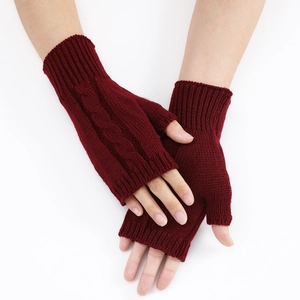 Detailed knit texture and cable twist design on burgundy fingerless wool gloves