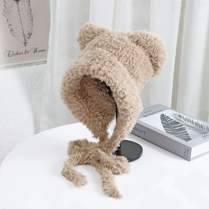 Winter plush bear ear hooded scarf hat in beige faux fur on display stand