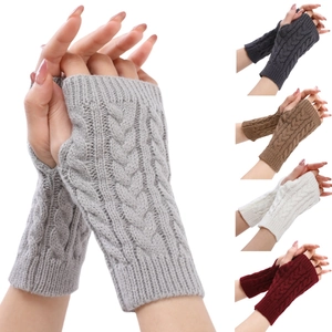 Detailed knit texture and color variants of fingerless cable-knit arm warmers