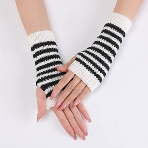 Detailed view of striped knit fingerless gloves with ribbed cuffs for winter warmth
