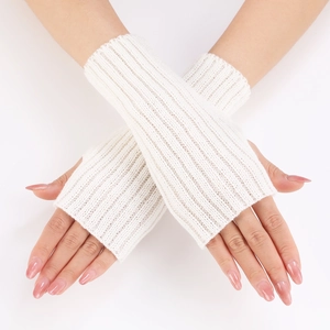 Detail of white ribbed knit arm warmers showing texture and fingerless design