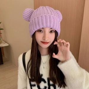 Detailed view of purple chunky knit beanie featuring cute 3D bear ears and ribbed texture