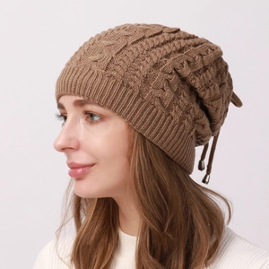 Winter cable knit beanie hat for men and women in dark khaki brown with drawstring detail
