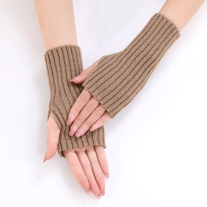 Detailed knit texture of khaki fingerless gloves with thumb hole for winter