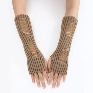 Detail of khaki distressed knit arm warmers with ripped holes and ribbed texture