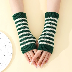 Detail of green and white striped knit fingerless gloves with ribbed cuffs
