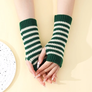 Close-up of green and cream striped knit fingerless gloves with ribbed cuffs and thumb hole