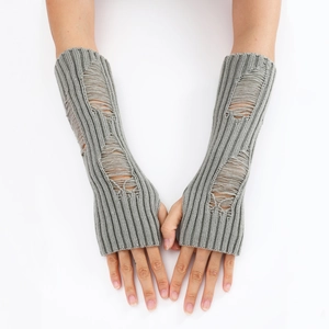 Detail of dark grey ribbed knit arm warmers with trendy ripped distressed holes