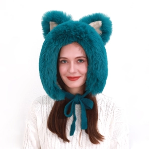 Detail of teal faux fur winter hat with cute animal ears and knit drawstrings for women