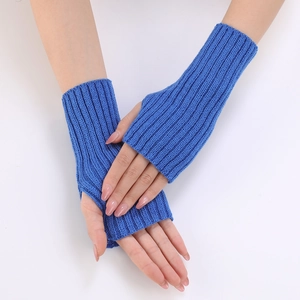 Detail of Klein blue ribbed knit arm warmers with thumb holes on white background