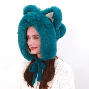 Detail of teal faux fur trapper hat featuring cute animal ears and soft beige fleece lining