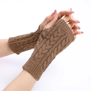 Detailed cable knit pattern on brown fingerless knit arm warmer sleeves