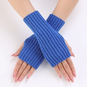 Close-up of royal blue ribbed knit arm warmers with fingerless design and textured finish