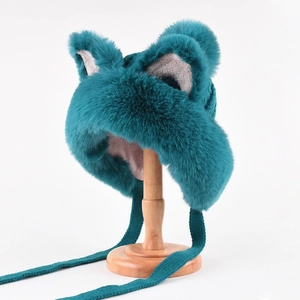 Detailed close-up of peacock blue plush earflap hat with cute faux fur cat ears