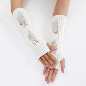Detailed texture of white distressed knit arm warmers with ripped hollow design