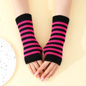 Detailed close-up of knit fingerless gloves with black and neon pink horizontal stripes