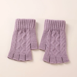 Detailed knit texture and cable pattern on purple fingerless arm warmers for women