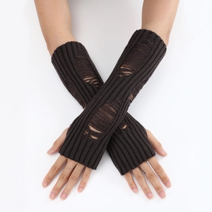 Close-up of dark brown distressed knit arm warmers with vintage ripped hole details