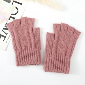 Detail view of pink knit arm warmers with thick ribbed cuffs and soft wool texture