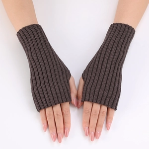 Detail of dark brown ribbed knit fingerless gloves showing thick woolen texture