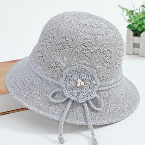 Elegant light gray crochet sun hat for women with floral pearl accents and tie straps