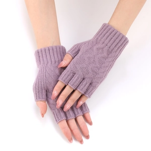 Close-up of light purple knitted fingerless gloves with fine texture and open thumb