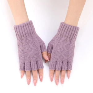 Detail of purple knit fingerless gloves showing the ribbed texture and wrist cuff
