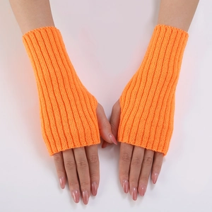 Detailed texture of fluorescent orange ribbed knit fingerless gloves with thumb hole