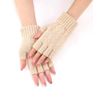 Detailed view of the soft knitted texture and ribbed cuff of the beige fingerless gloves