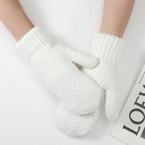 Detailed view of white knit fingerless gloves with ribbed cuffs and warm thick texture