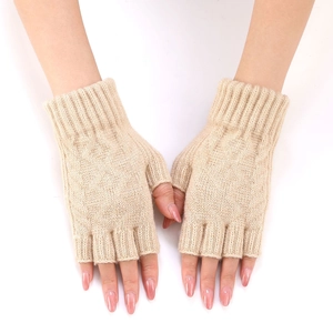 Detailed knit texture of beige fingerless gloves with ribbed cuffs and thumb holes