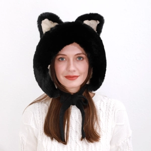 Detail of plush faux fur animal ear hat with black chin straps and soft knitted lining