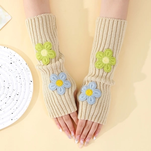 Beige knitted fingerless long gloves with floral embroidery and ribbed texture