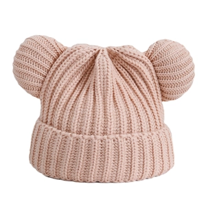 Pink knit beanie for kids with cute bear ears and thick ribbed texture for winter warmth