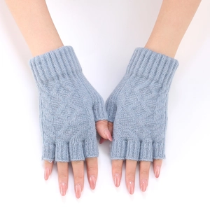Detailed knit texture of light blue fingerless gloves with elastic ribbed wrist cuffs