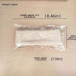 Flat lay of oatmeal knit fingerless arm warmers in packaging on wooden surface